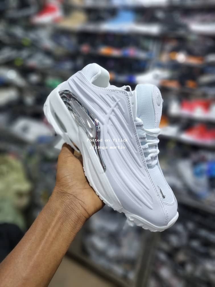 Stylish White Sneakers with Sleek Design for sale in Kampala - Yilick
