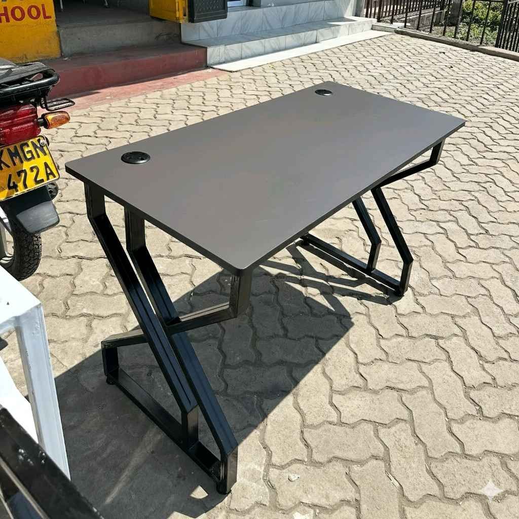 Gray office Table with metallic frame 1.2 metres by 60cm for sale in Kampala - Yilick