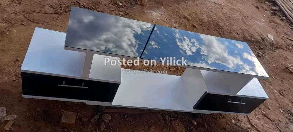 TV stand black and white with glass for sale in Kampala - Yilick