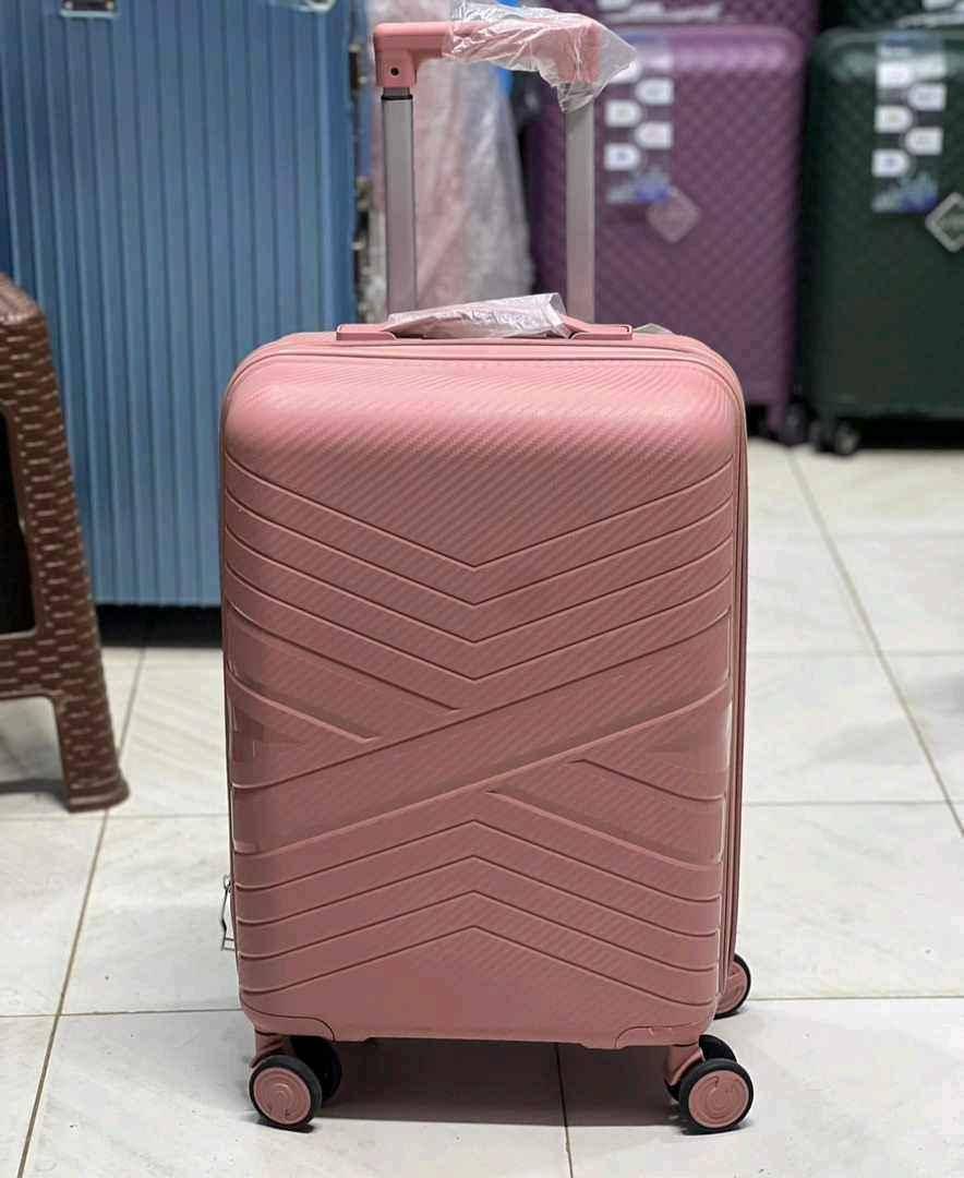Rubber plastic suitcases medium size for sale in Kampala - Yilick