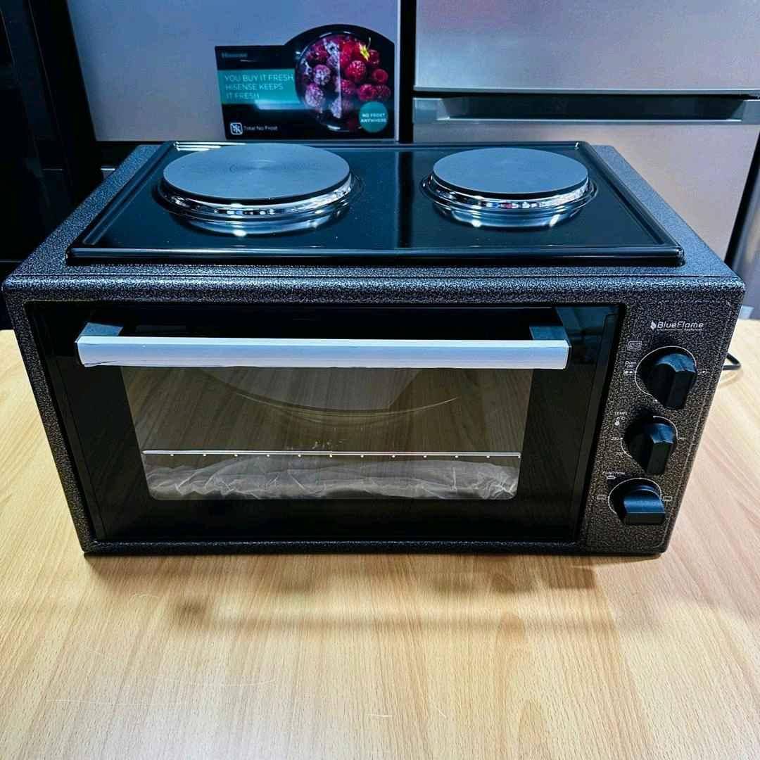45 litres mini oven with top cooker plates/ blueflame oven for sale in Kampala - Yilick